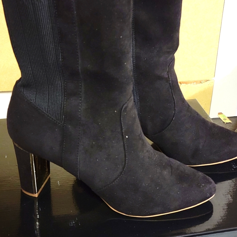 Iman boots size 10